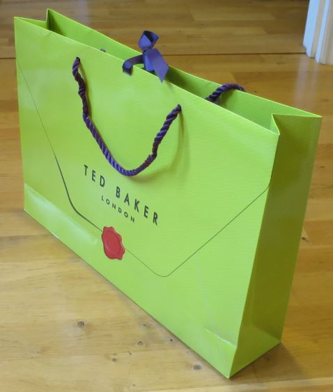 Påse som antyder att man handlat på en dyr affär.